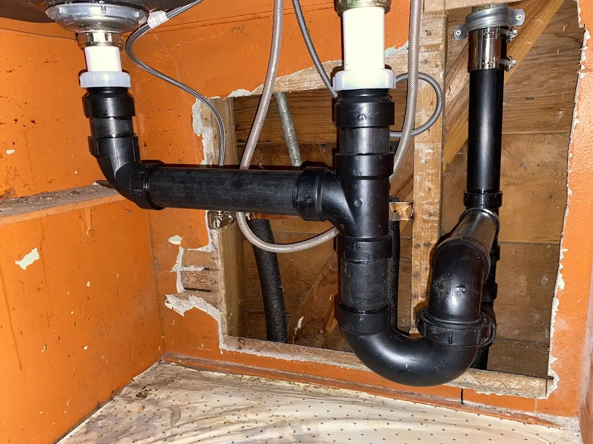Professional Garbage Disposal Repair equipment and tools on the job in Lovington
